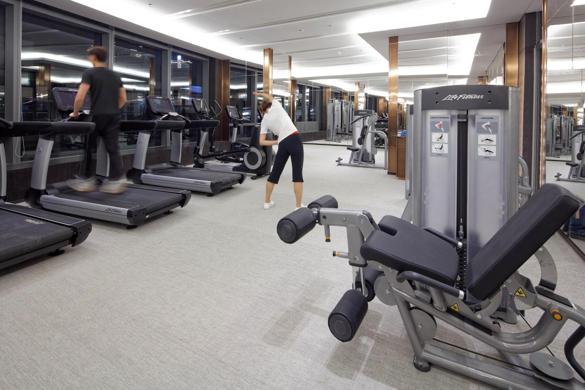 Gimnasio Fraser Suites Dalian