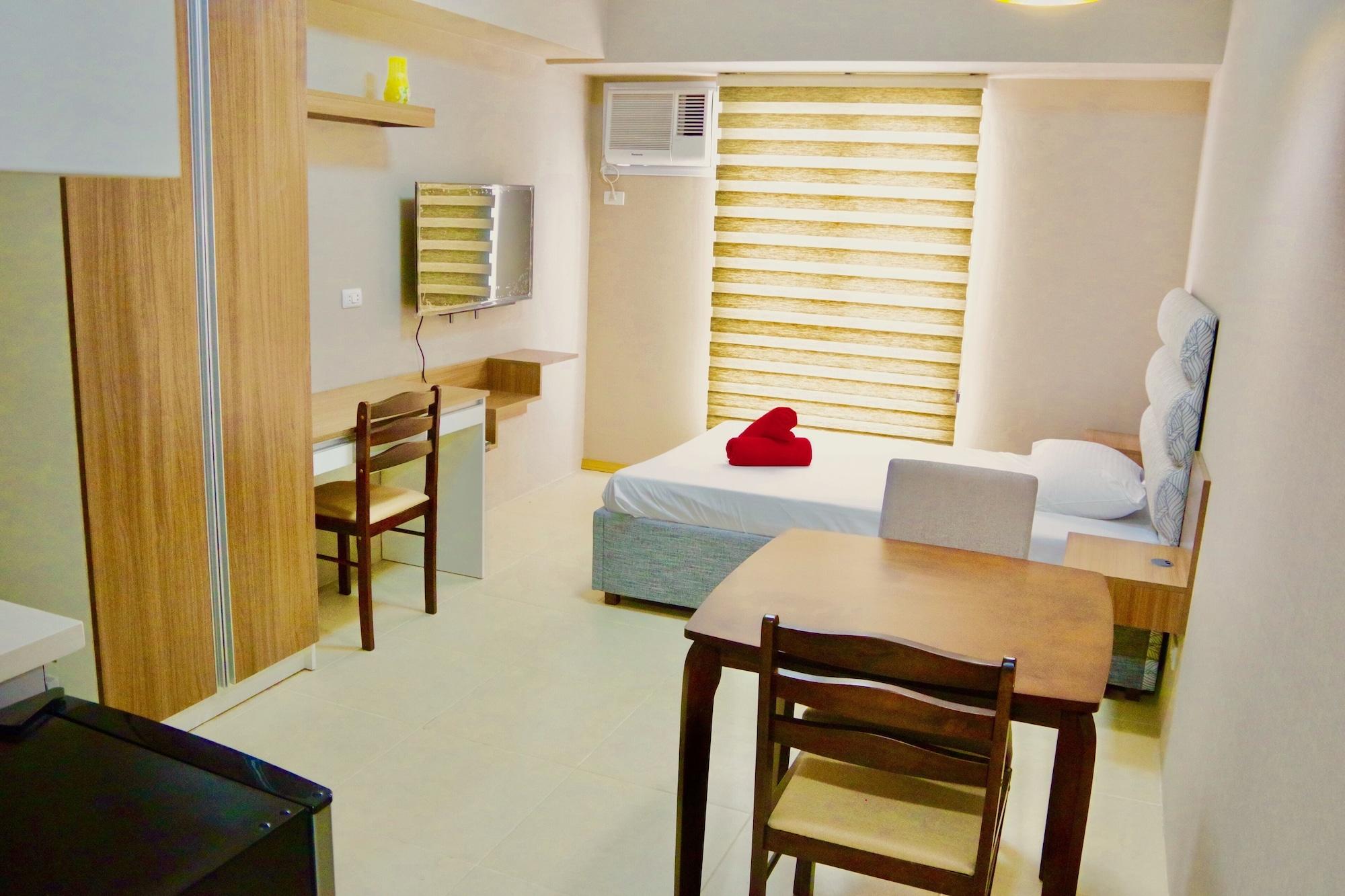 Habitación Avida Towers Riala