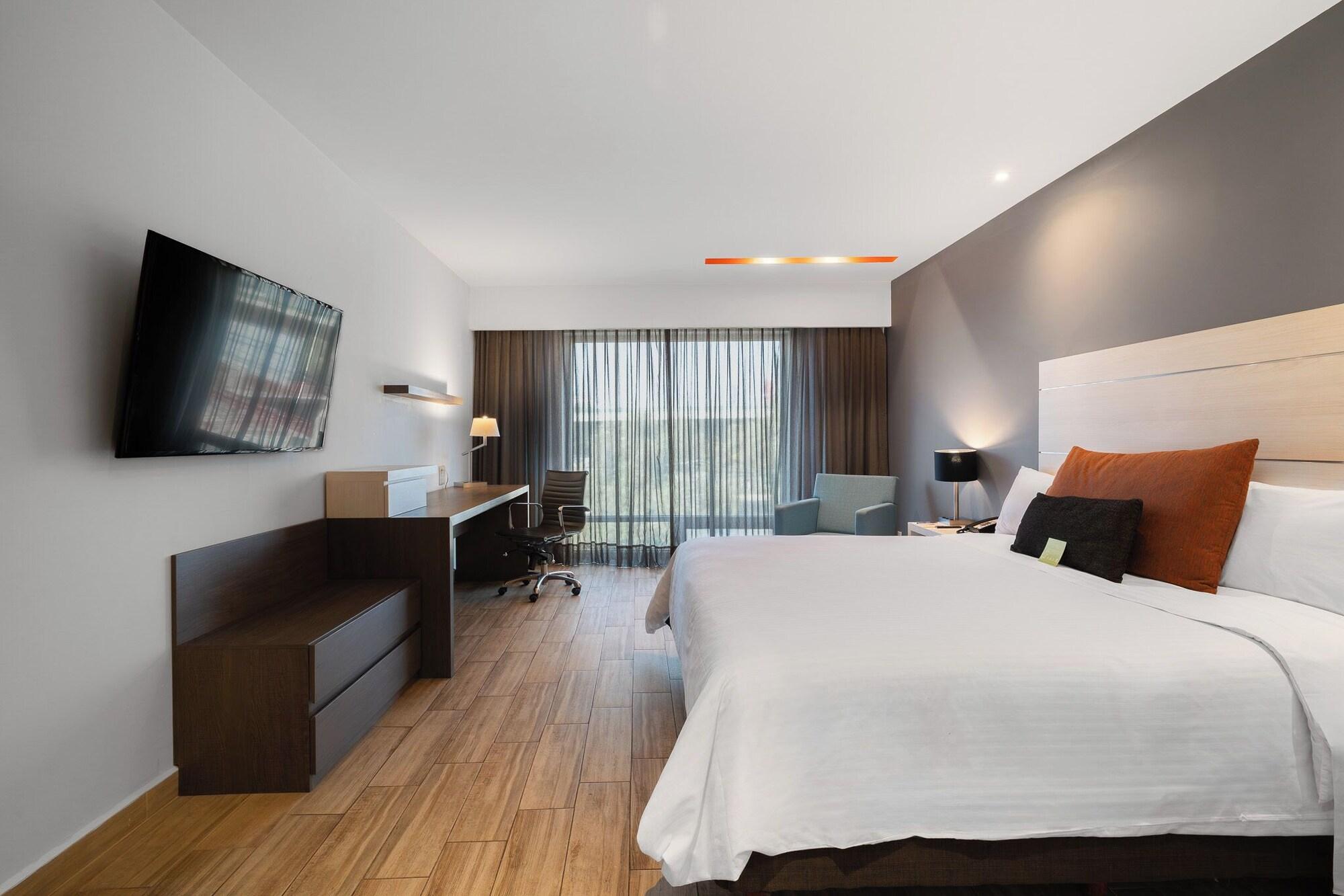 Habitación Real Inn Perinorte