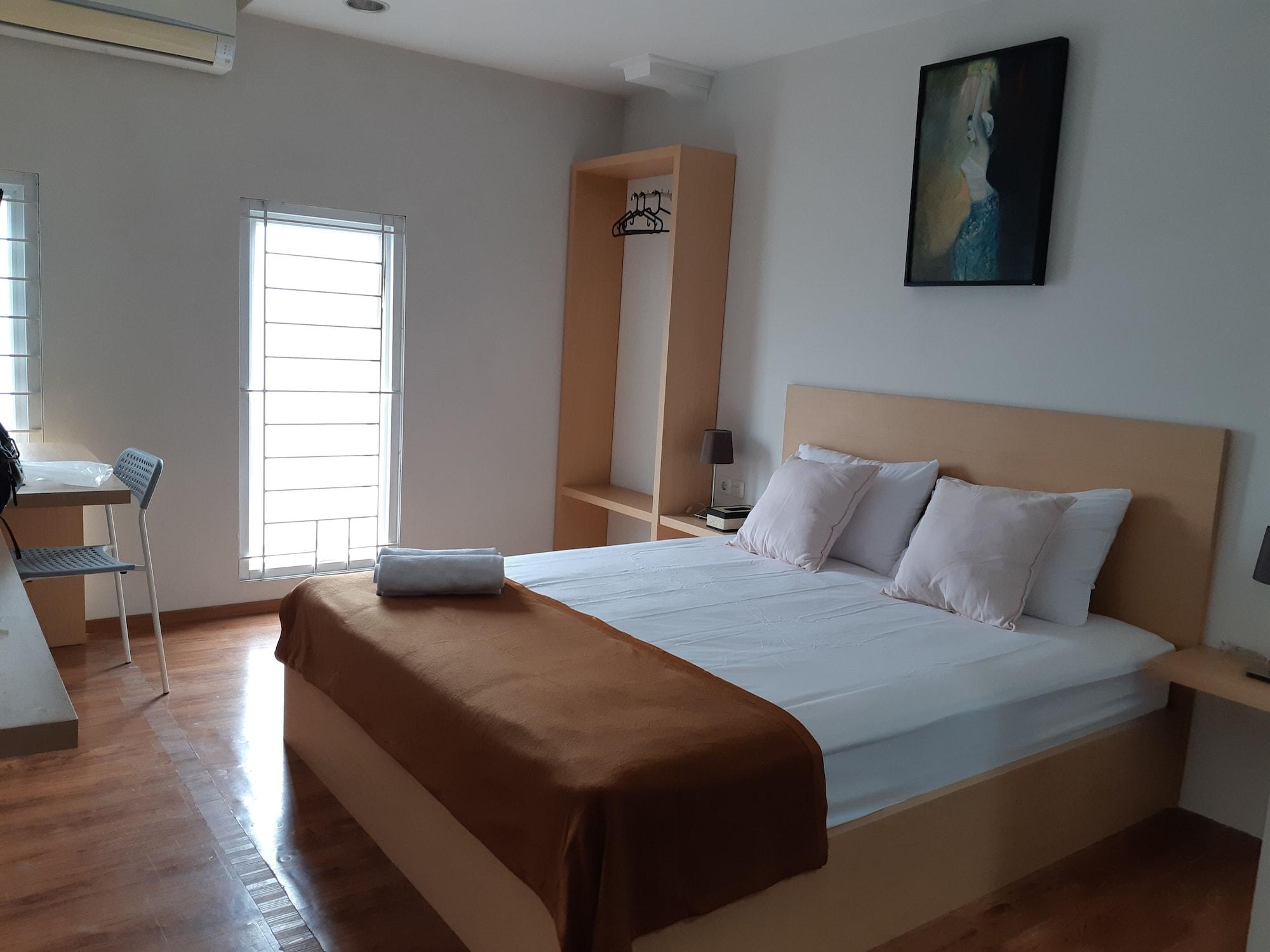 Habitación UROOMS Senayan