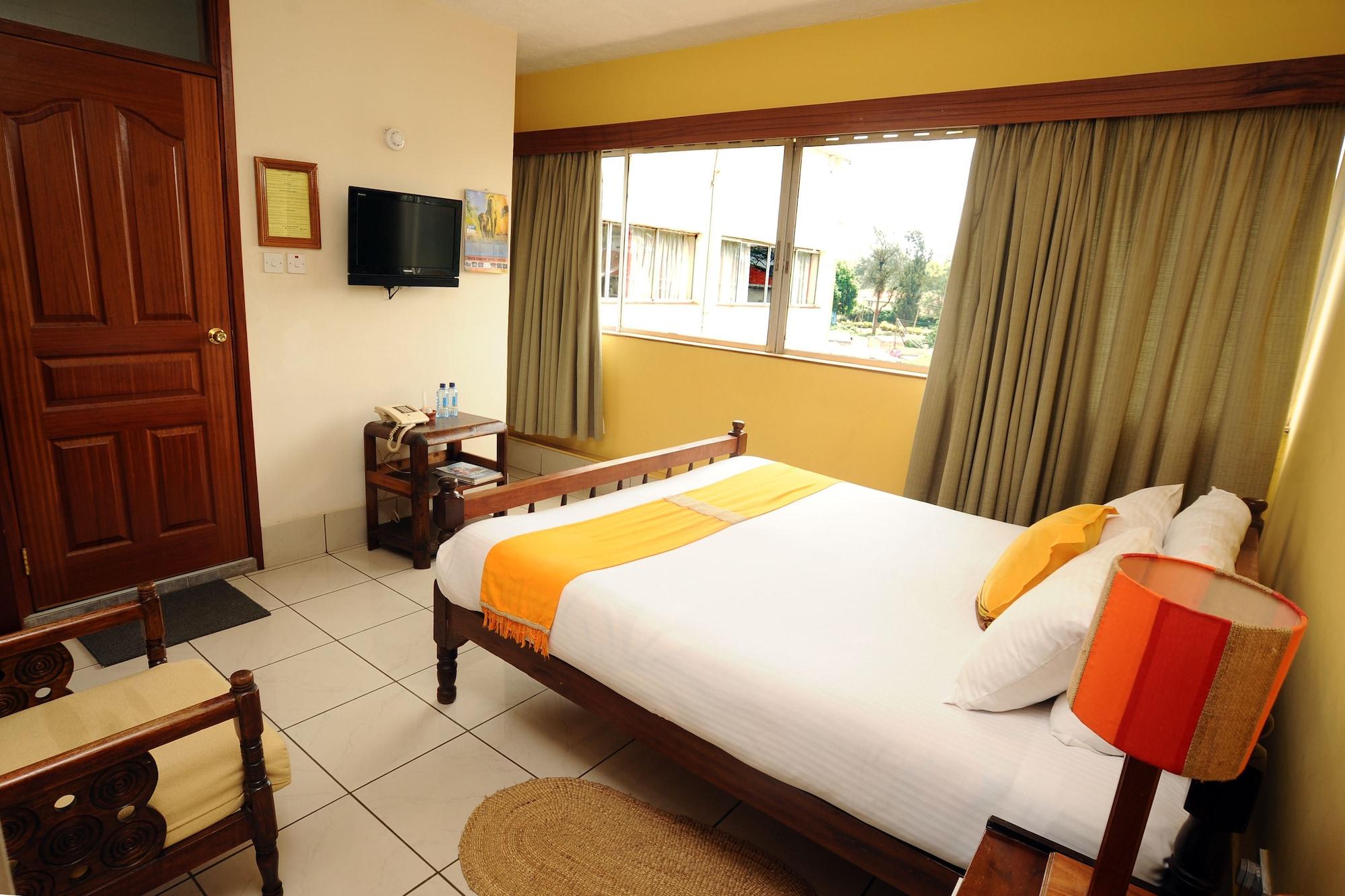 Habitación Kenya Comfort Suites