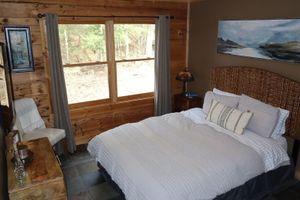 Arriendo temporal - Secluded modern log cabin with picturesque private water fall on 12 acres!