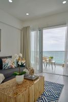 Alquiler Vacacional - Caribbean Sunrise View Beachfront Apartment