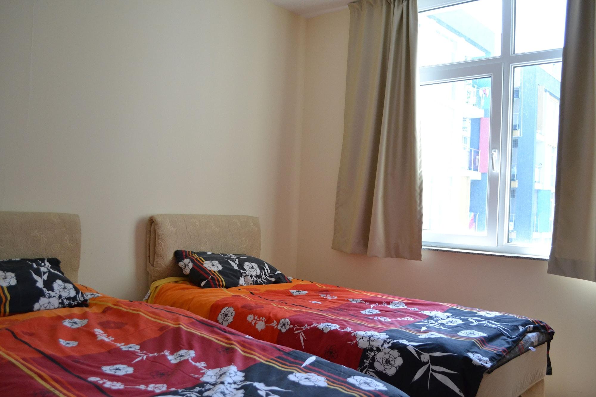 Habitación Sun City Apartments