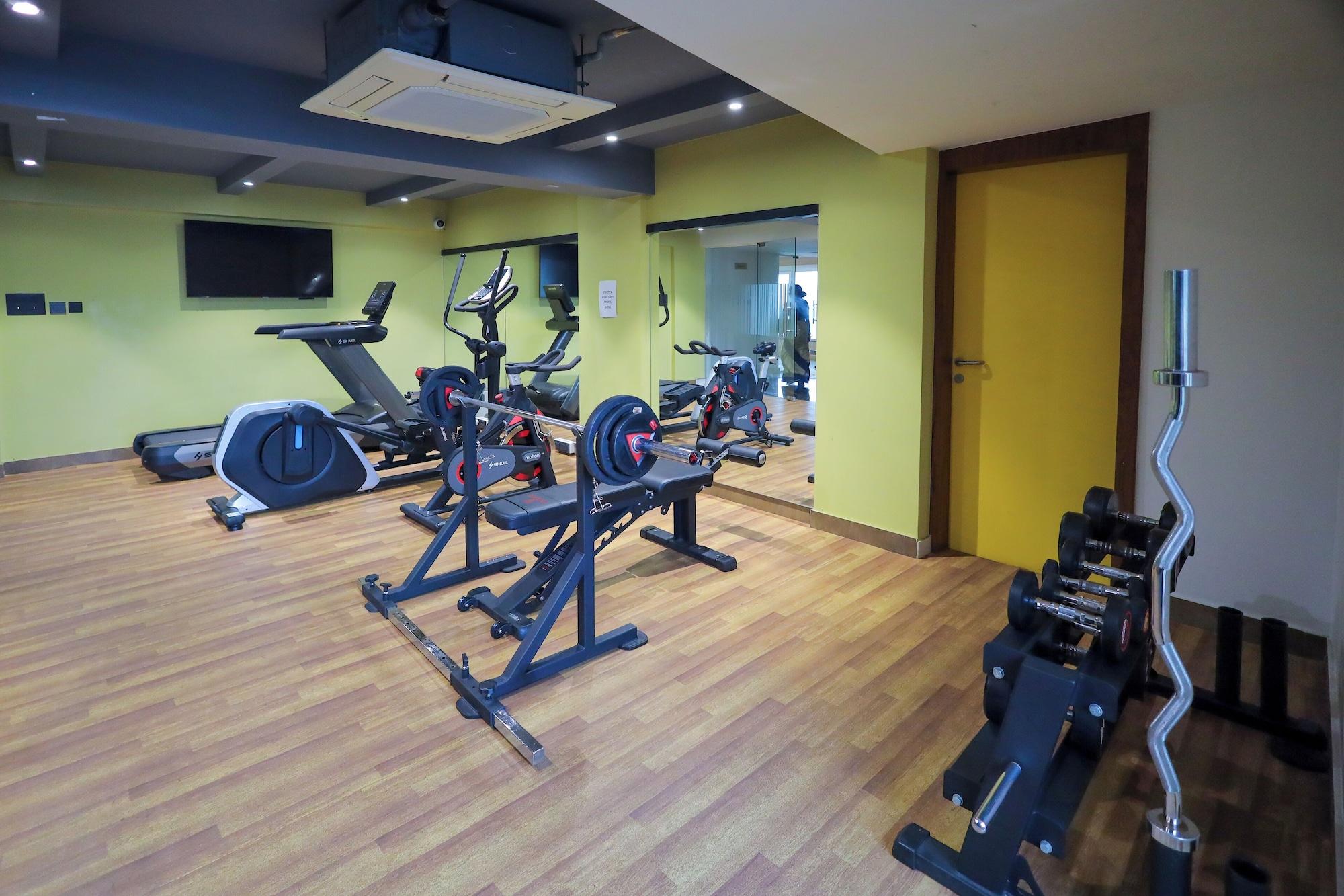 Gimnasio Royal Plaza Suites by RAK Rooms