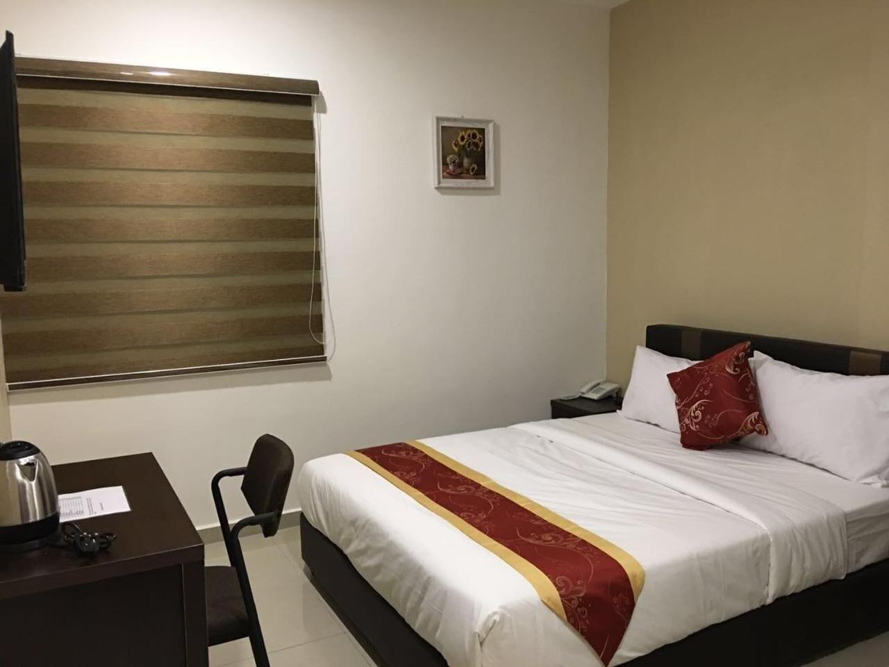 Habitación Global Inn Hotel