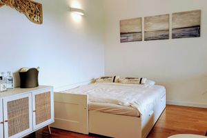 Alquiler Vacacional - Unique garden apartment in beach villa directly on the lake