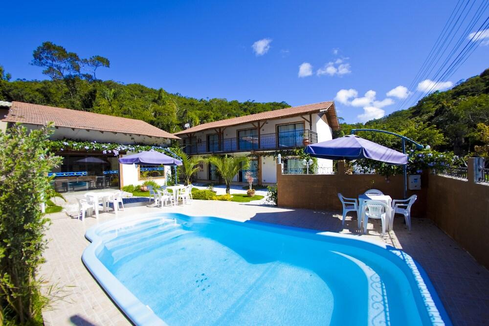 Vista da piscina Pousada Don Pablo