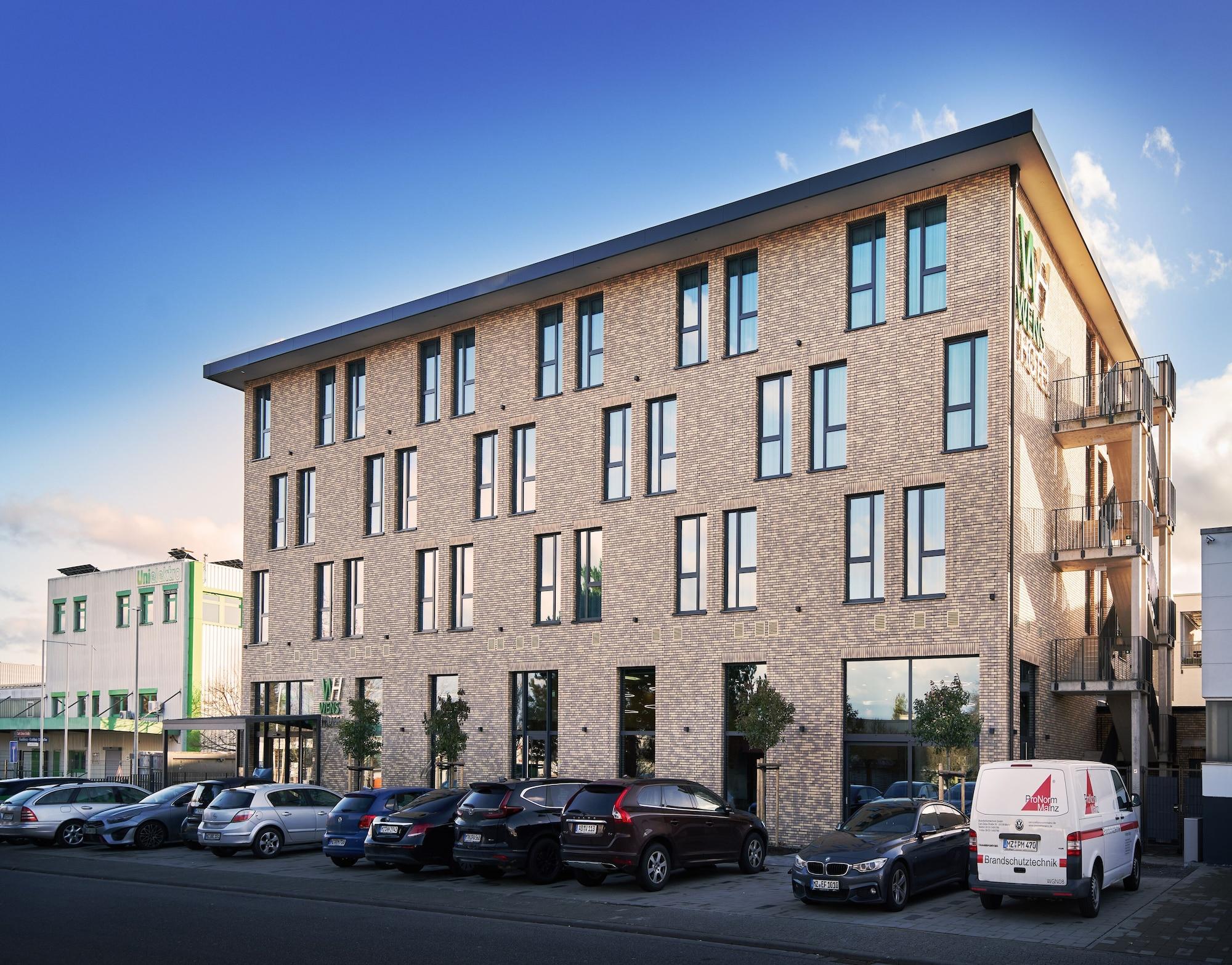 Vista Exterior WENS Hotel