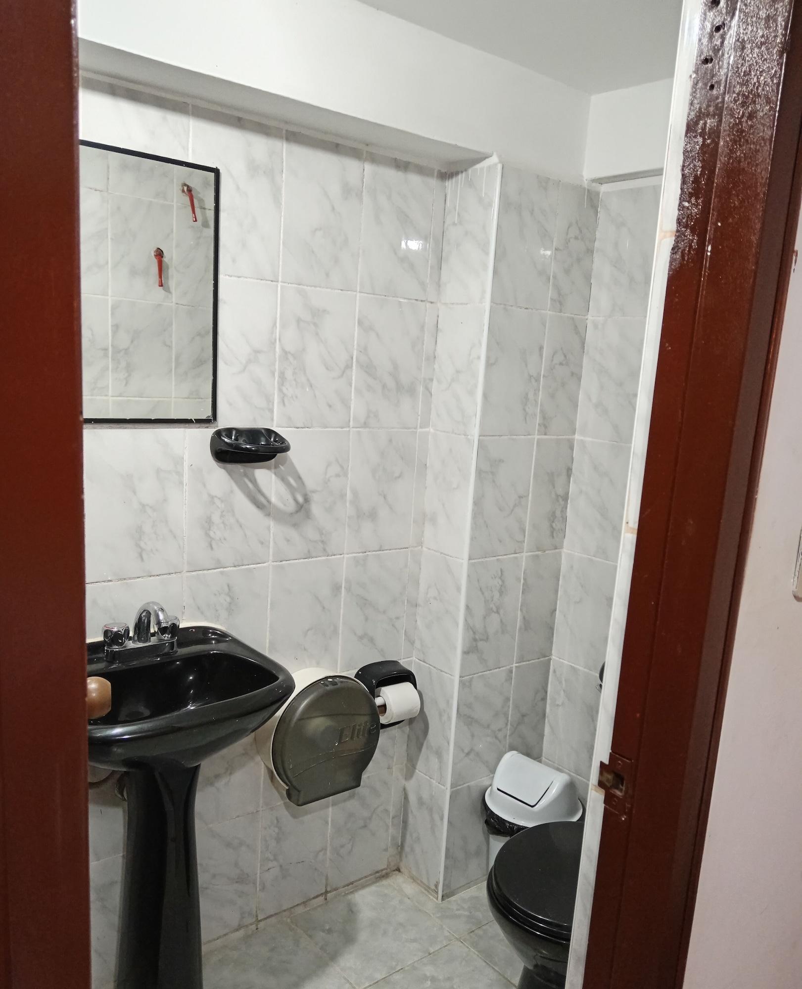 Comodidades do quarto Hostal sinchiroca machupicchu