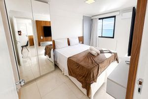 Aluguel por temporada - Hosts BR - Flat frente mar