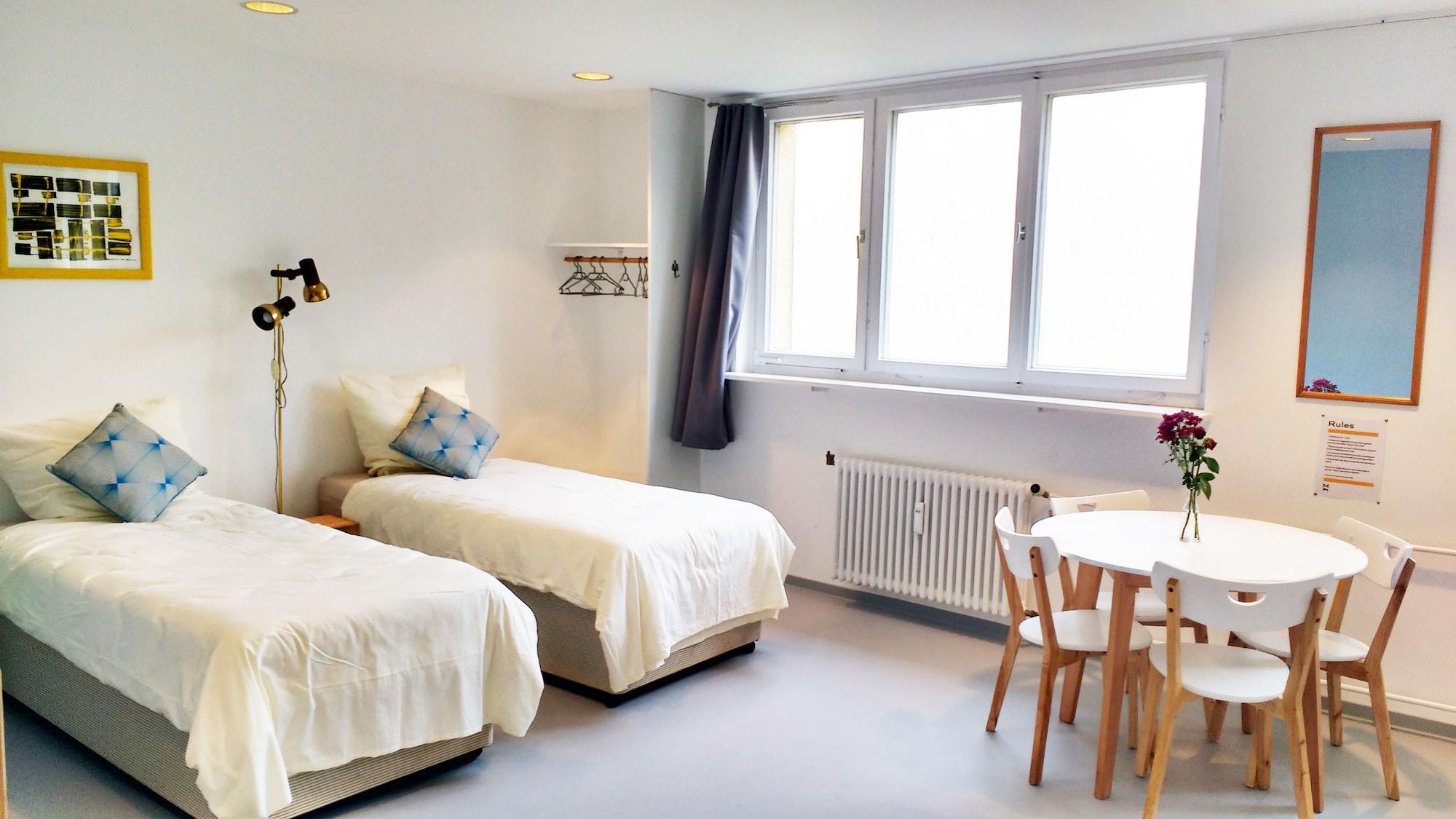 Habitación M I N I T E L