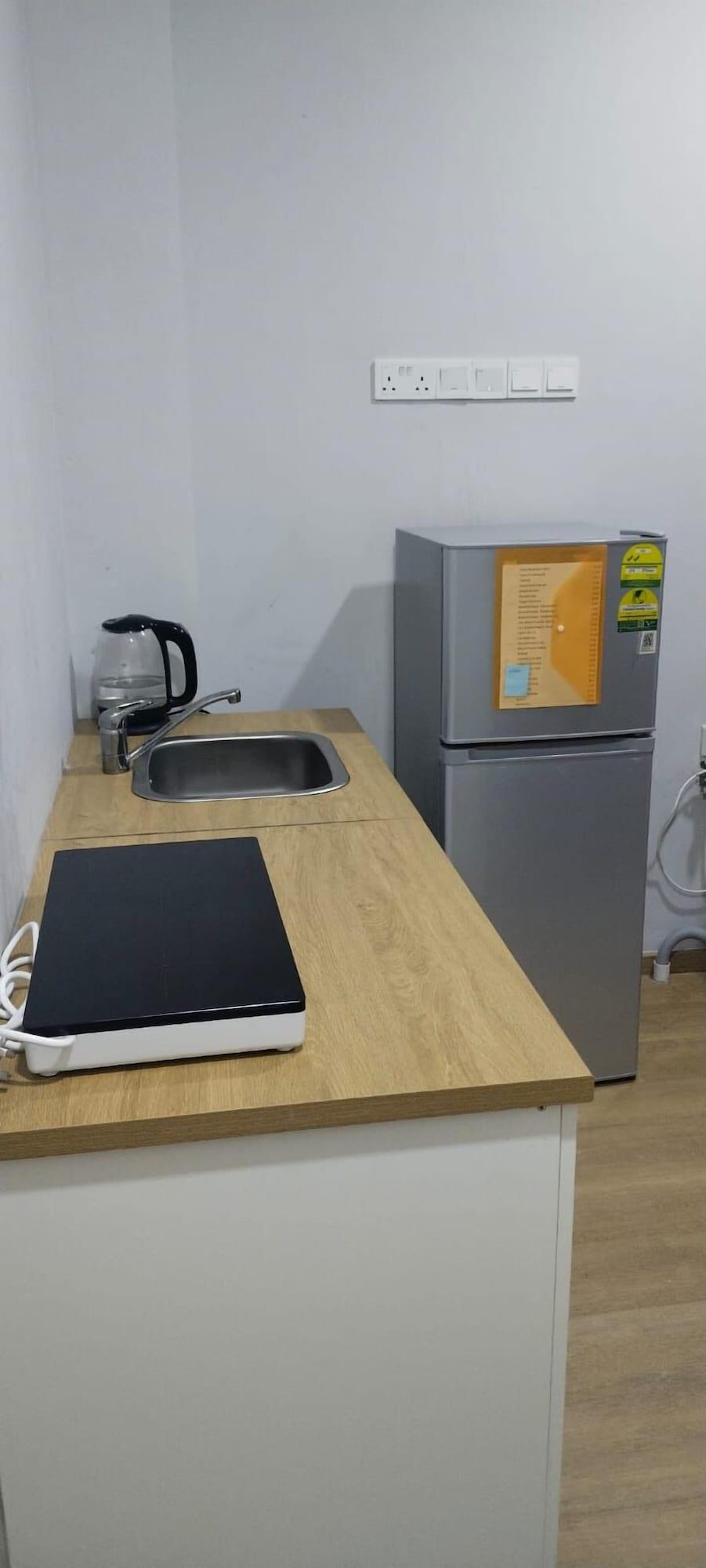 Equipamiento de Habitación The Family Suites Serviced Apartments