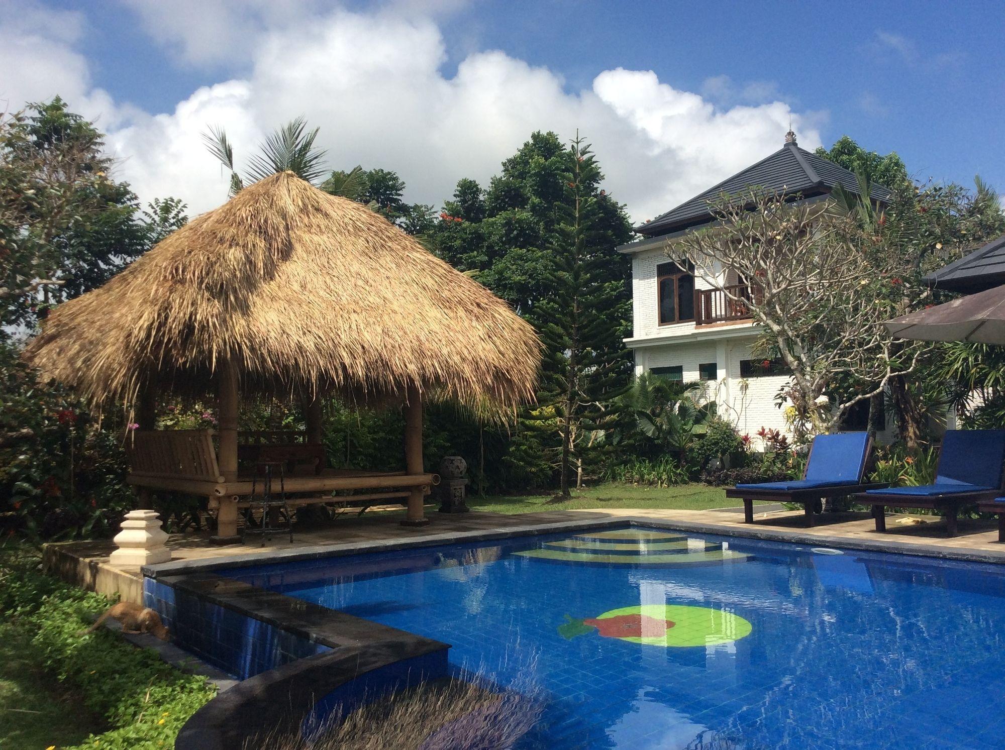 Vista Piscina Terang Bulan Cottages