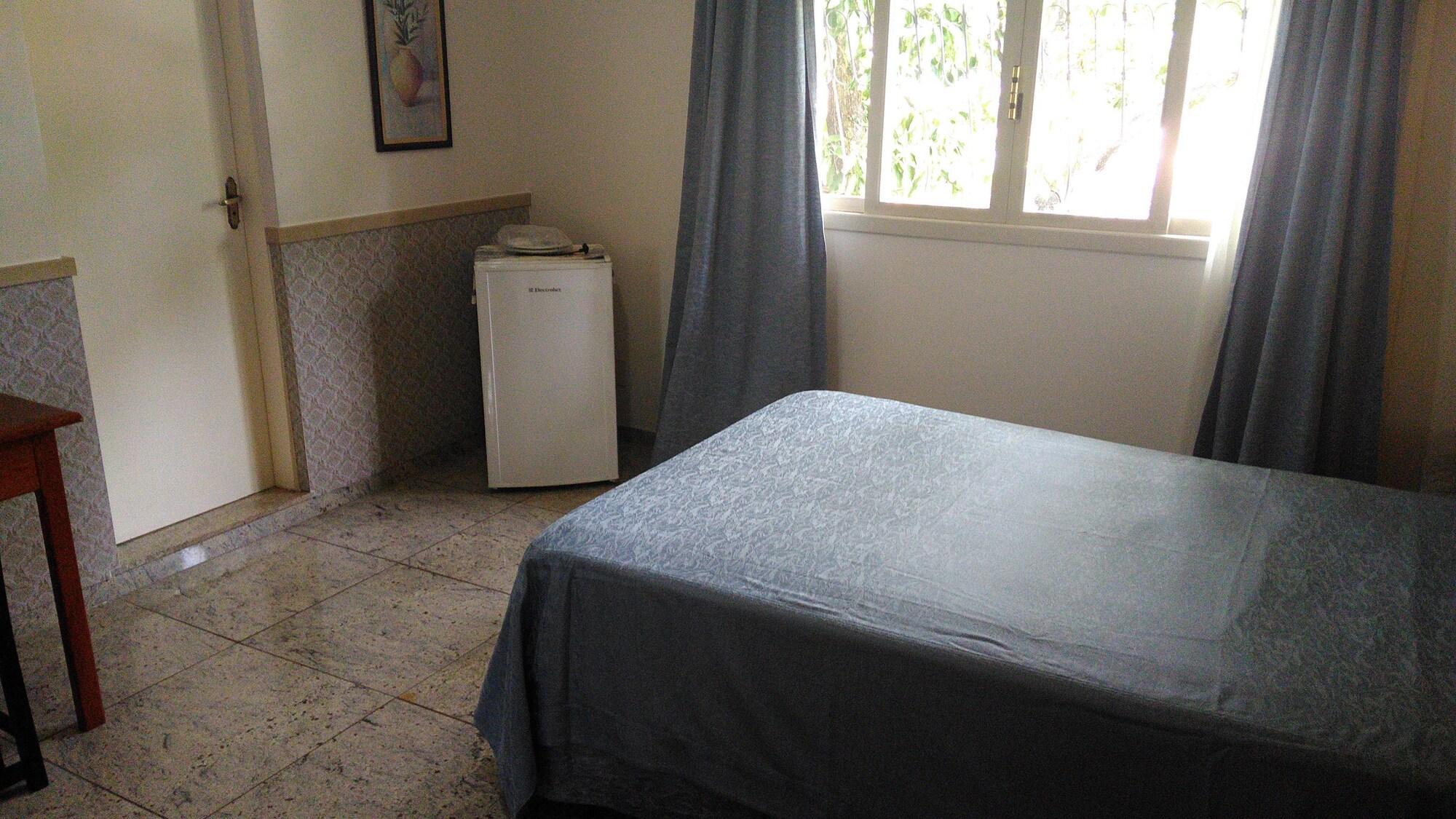 Habitación Villa Norma Suites