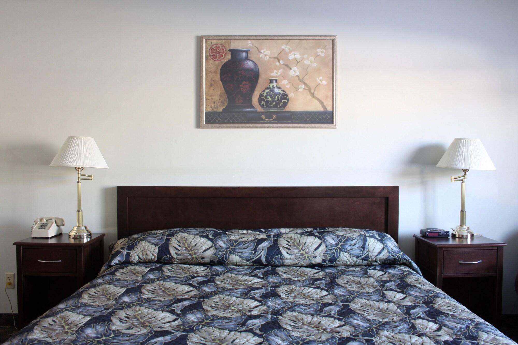 Habitación Sunset Inn and Suites