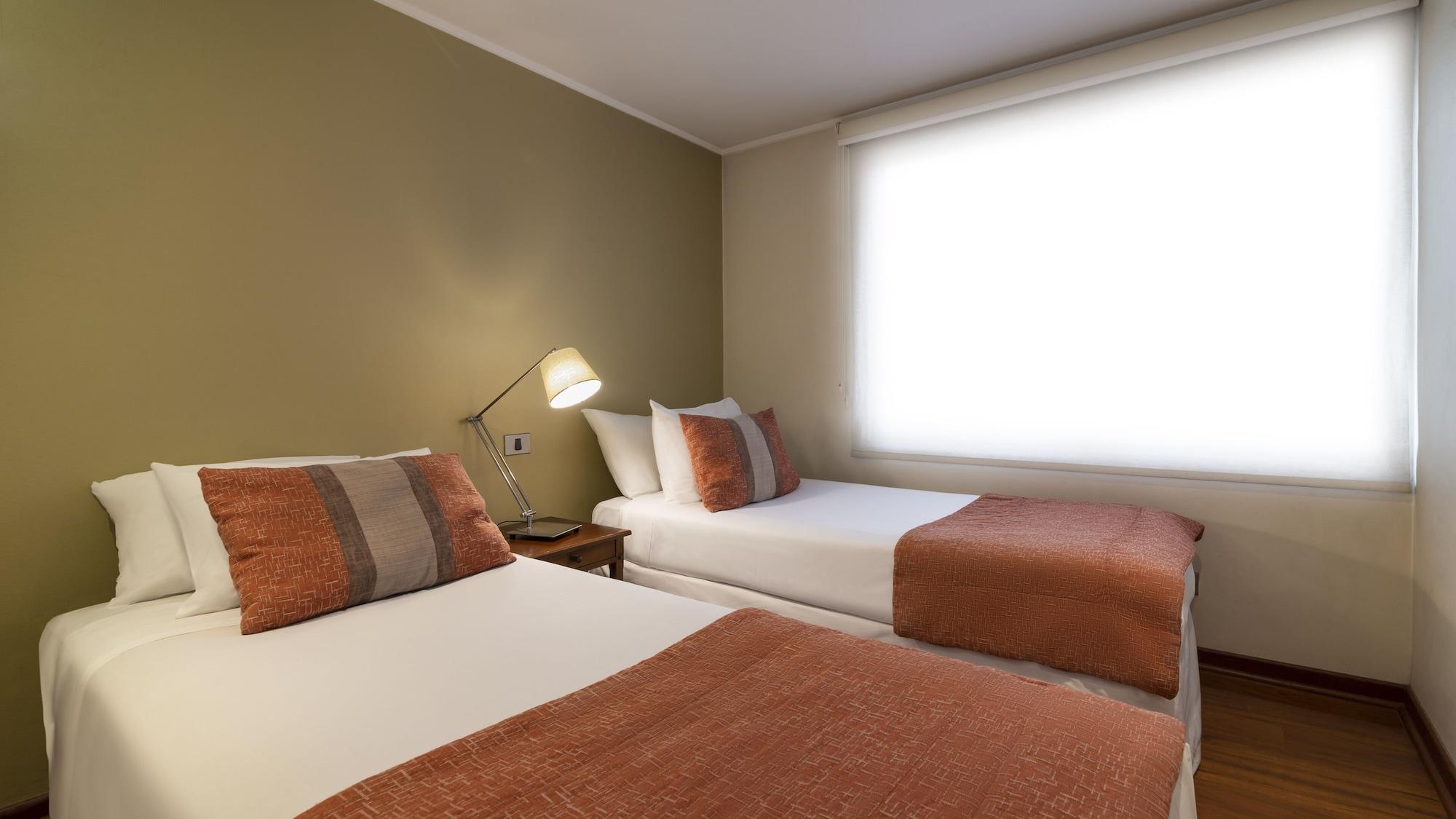 Habitación Time Suite - Comfort Apartments