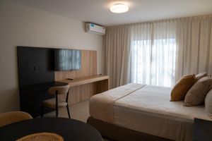 Alojamiento - Urbana Suites