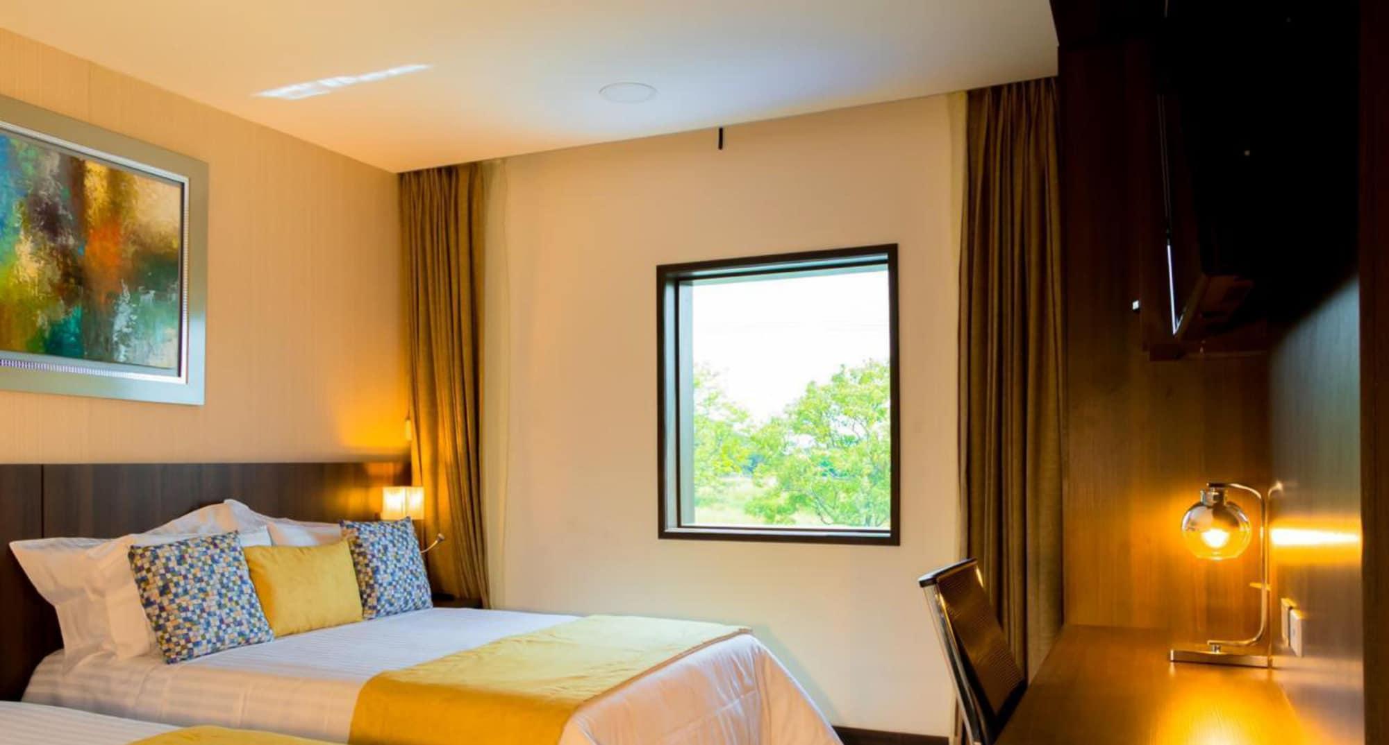 Habitación Hotel Real Elim International