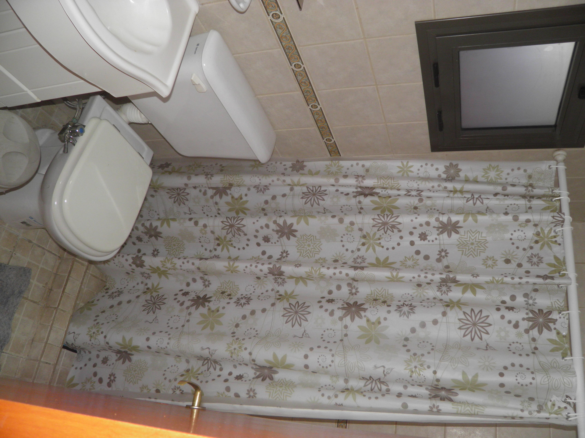 Baño CARLOS PAZ HOSTEL SUITES