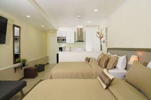 Alquiler Vacacional - Deluxe Palm Beach Suite Steps Away From the Beach & Marriott Hotel