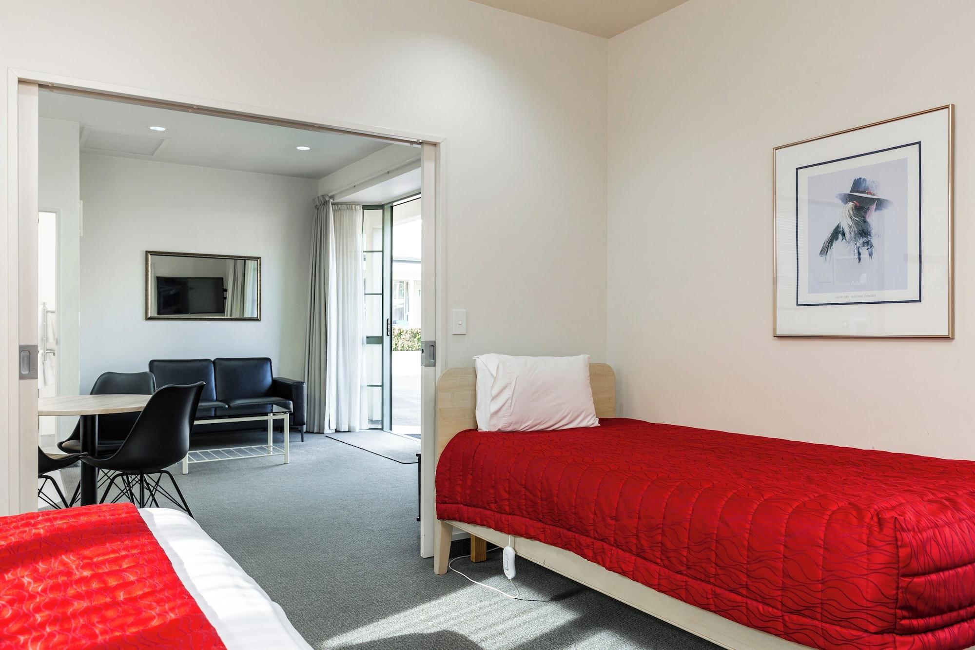 Habitación Jasmine Court Motel