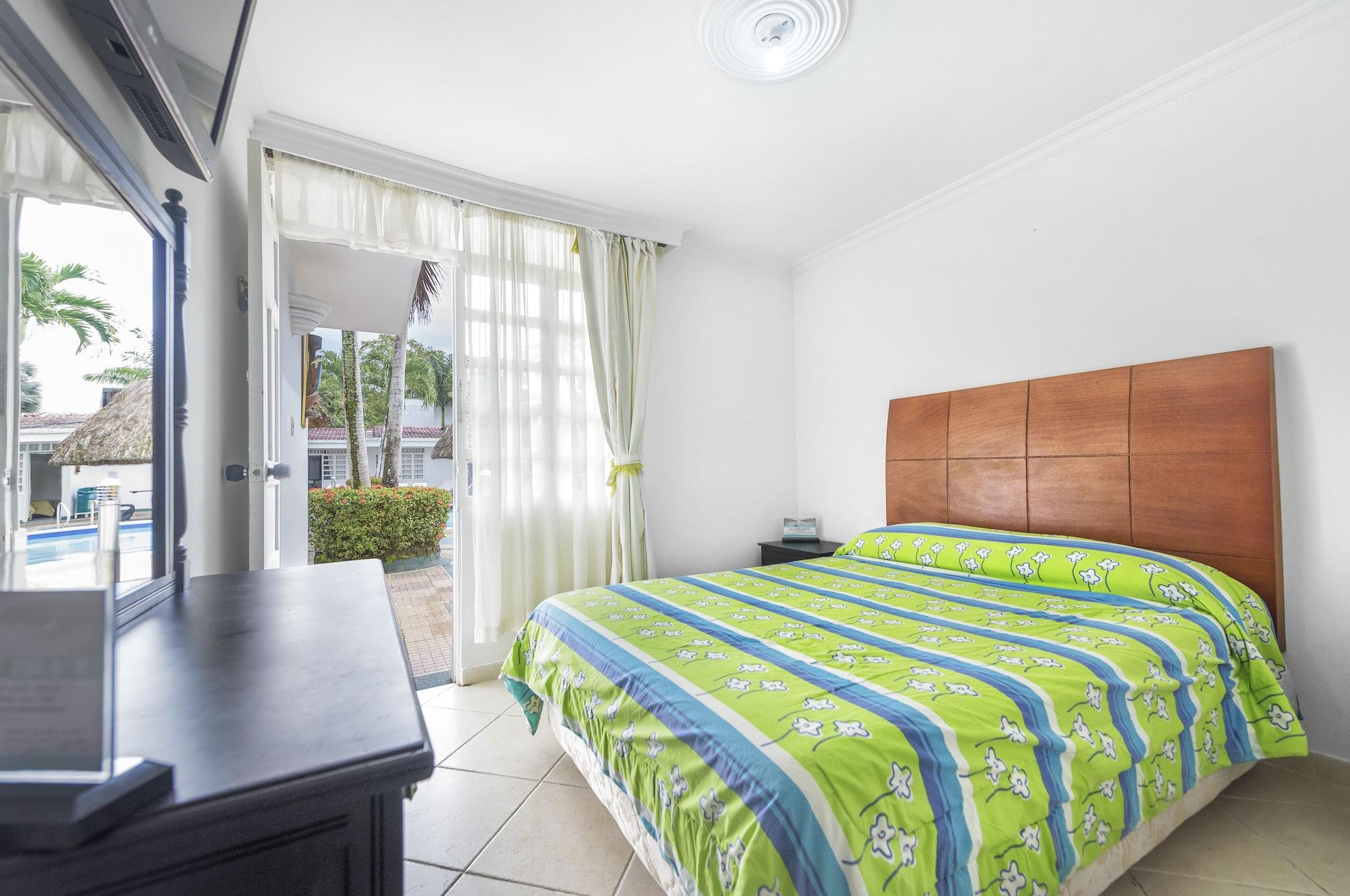 Quarto Hotel Santa Barbara