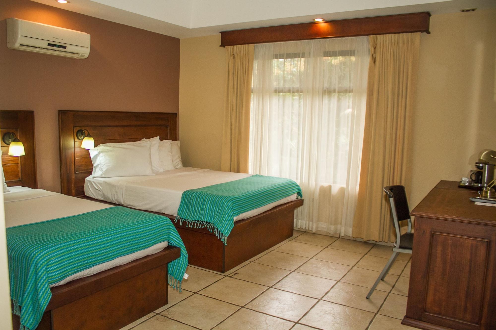 Habitación La Riviera Hotel B&B