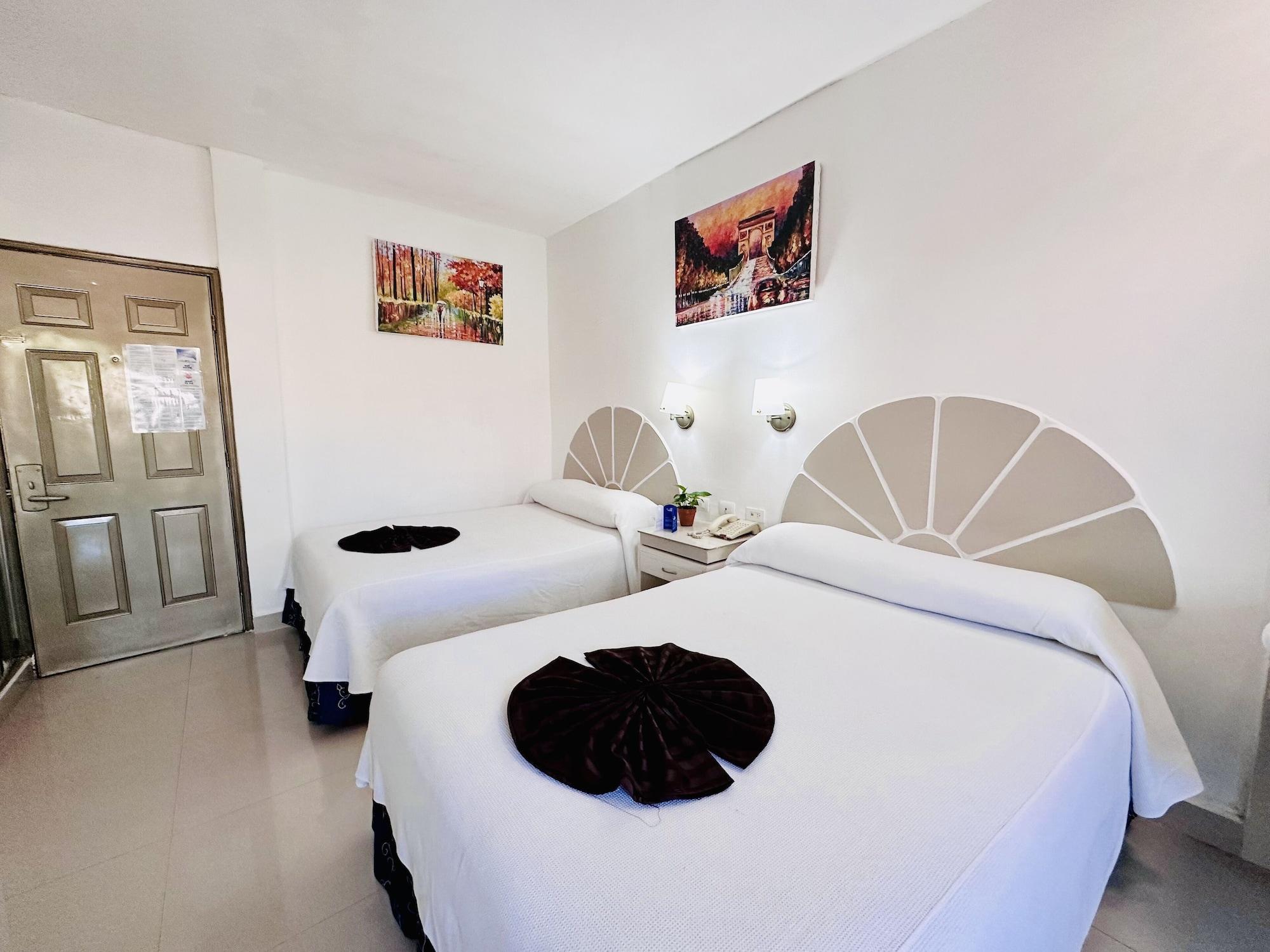 Habitación Hotel Plaza Caribe