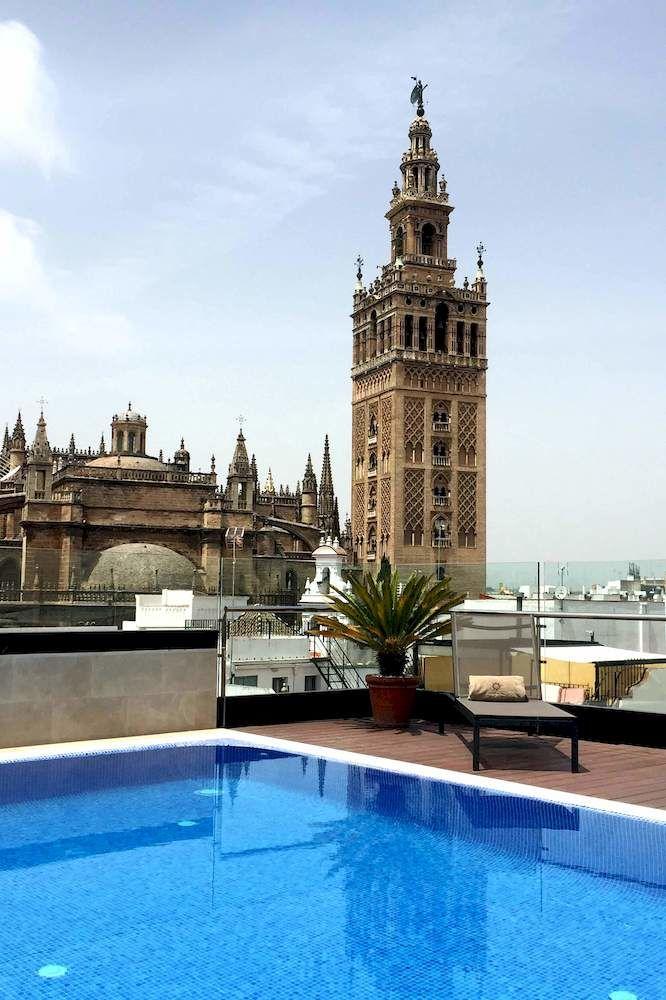 Vista da piscina Hotel Casa 1800 Sevilla