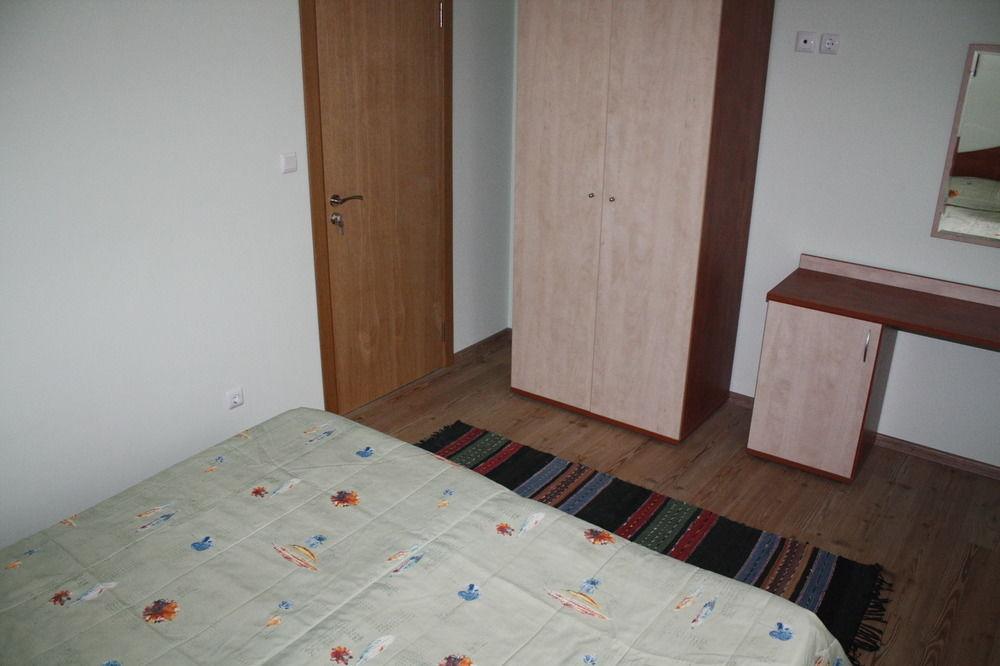 Habitación Golden House Apartments