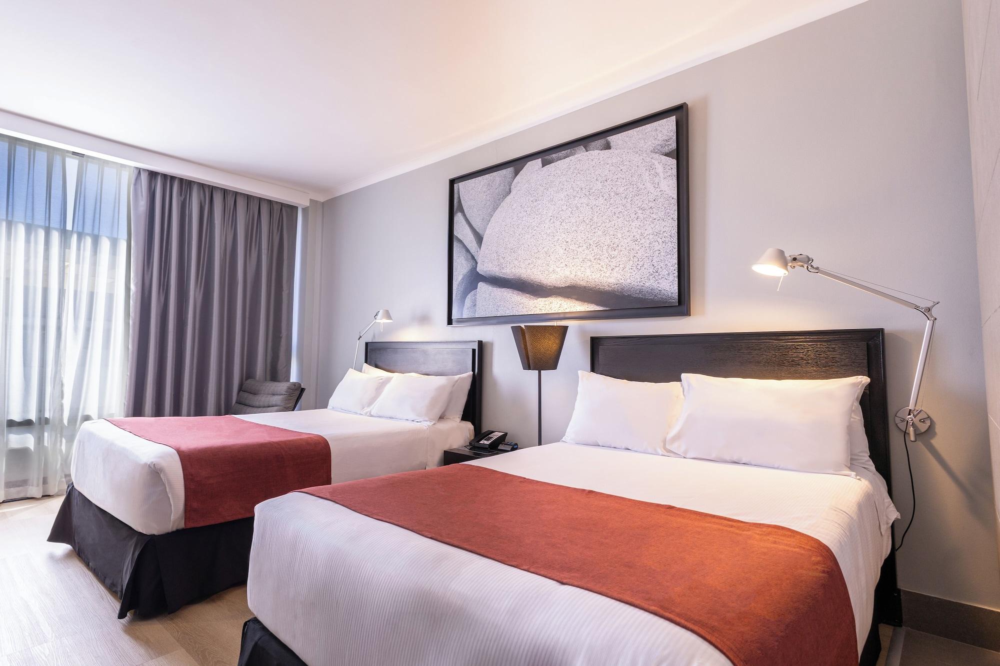 Quarto Wyndham Santiago Pettra