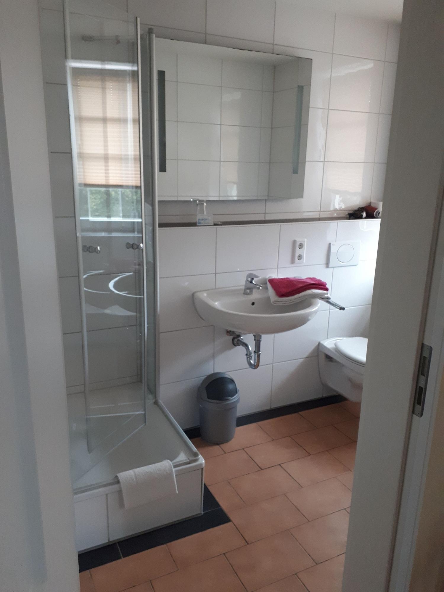 Comodidades do quarto Deutsches Haus Verl