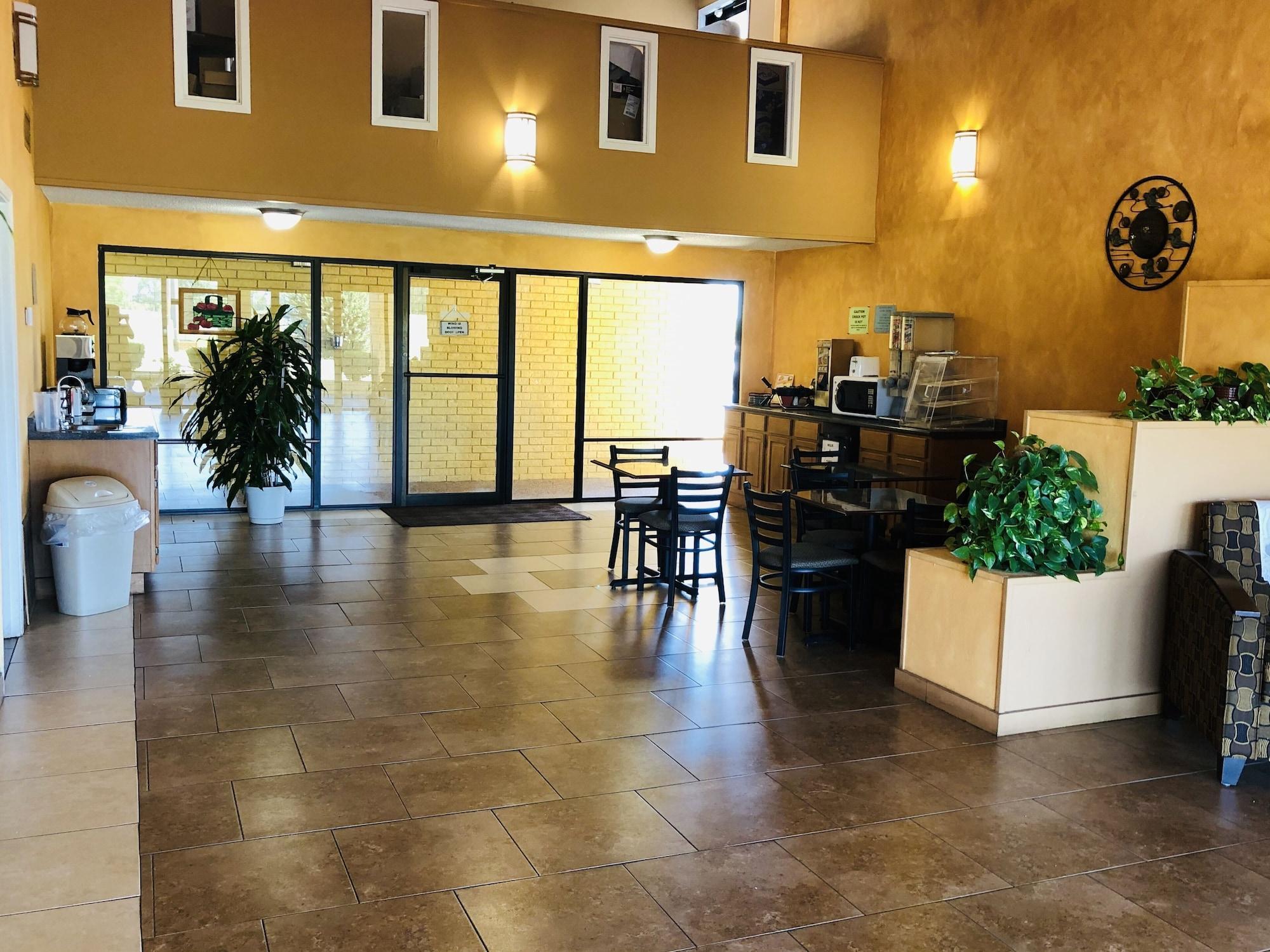 Restaurant Executive Inn & Suites