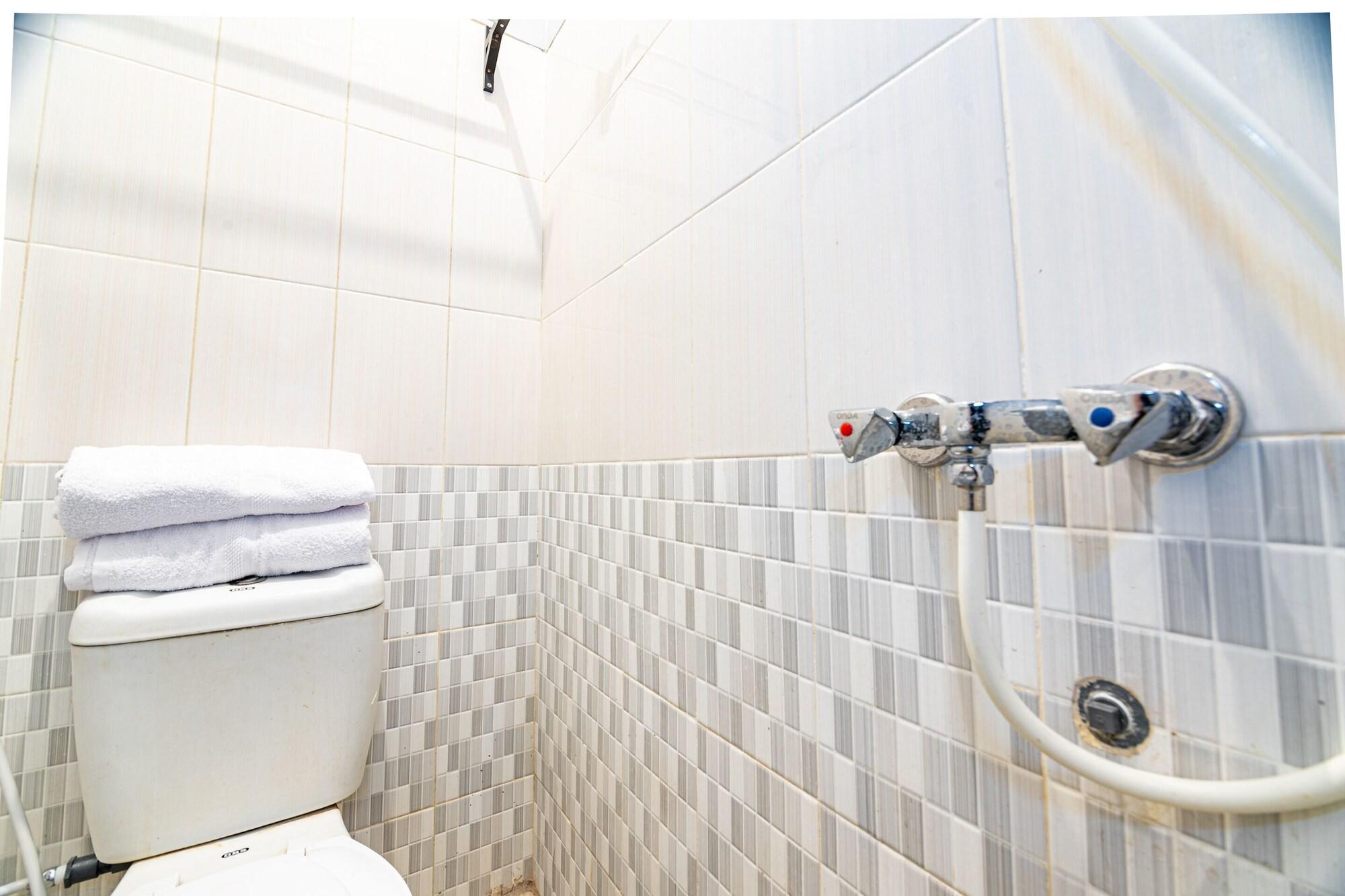 Equipamiento de Habitación OYO 1560 Griya Amin