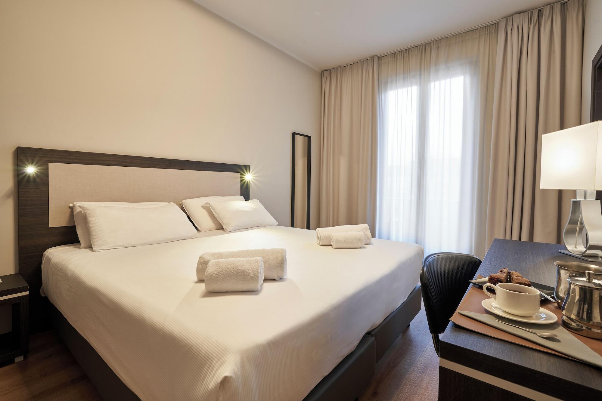Habitación Hotel Leonardo Da Vinci