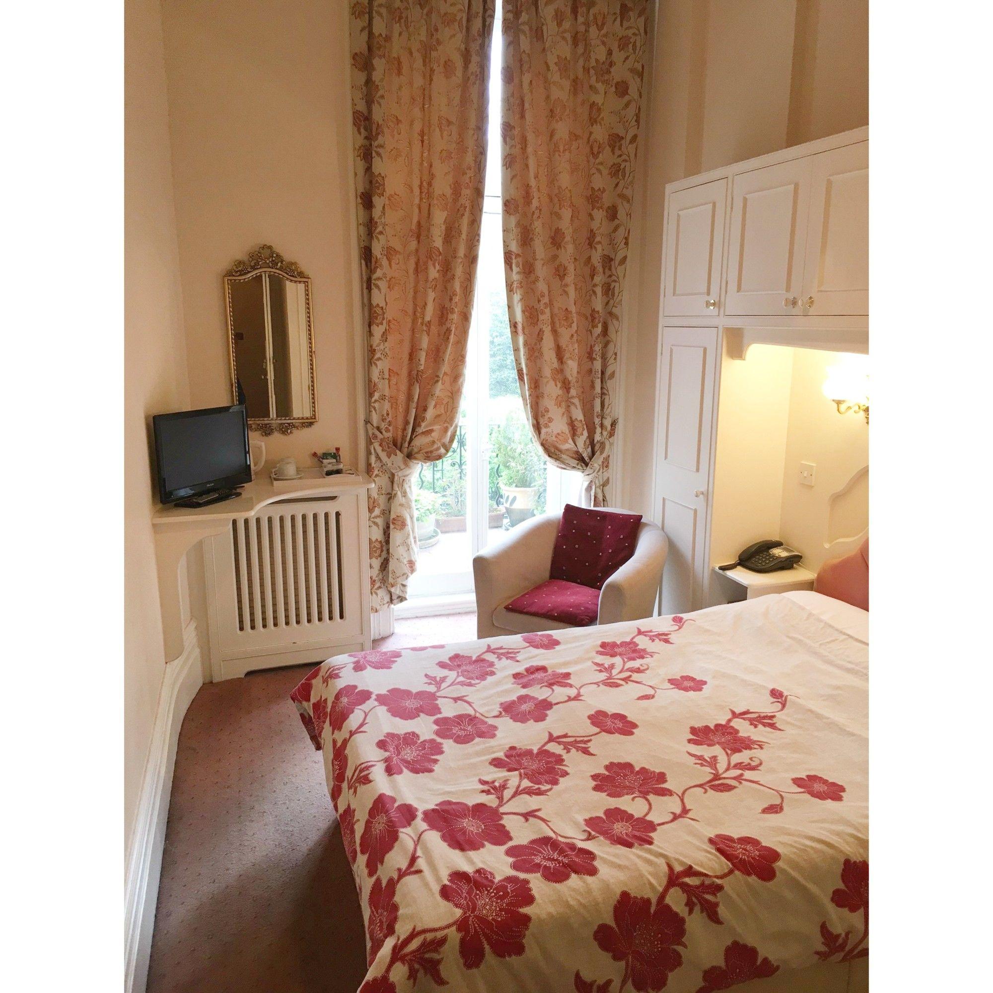 Habitación Maranton House Hotel