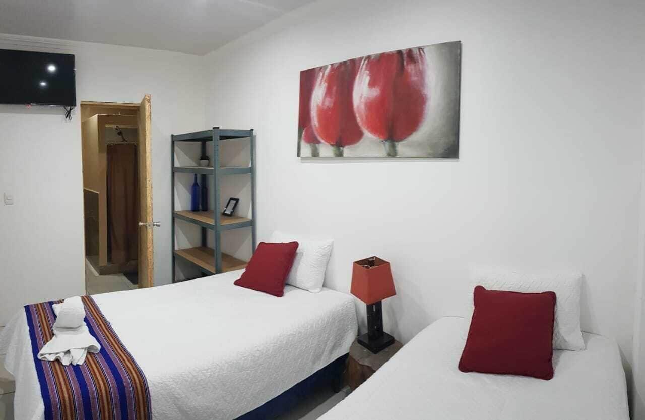 Habitación Sab Casa de Huéspedes