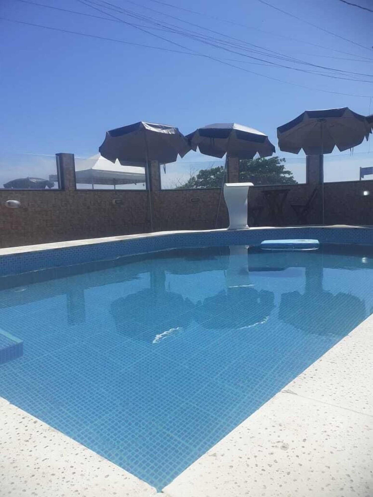 Vista Piscina POUSADA ESPAÇO PÉROLA