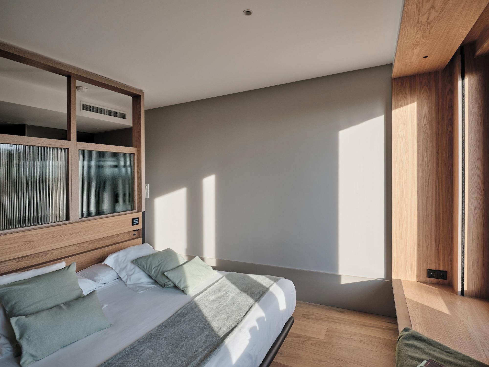 Habitación Qgat Suites & Events