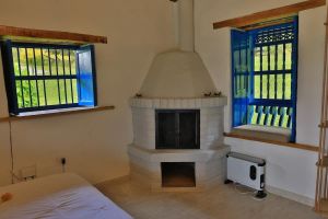 Alquiler Vacacional - Guatape Casita exit to the lake and views of the stone.