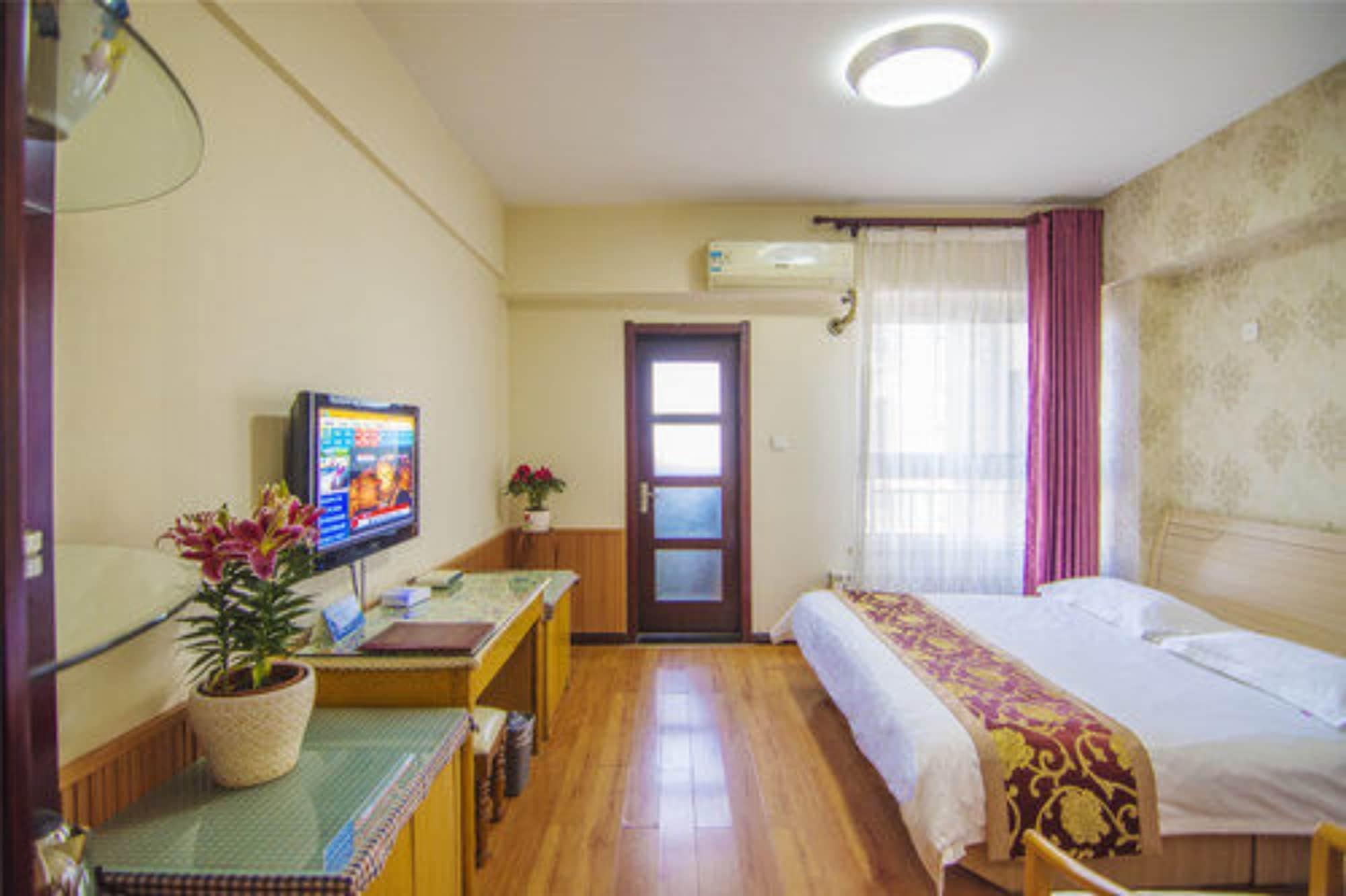 Habitación Golden Tree Business Hotel