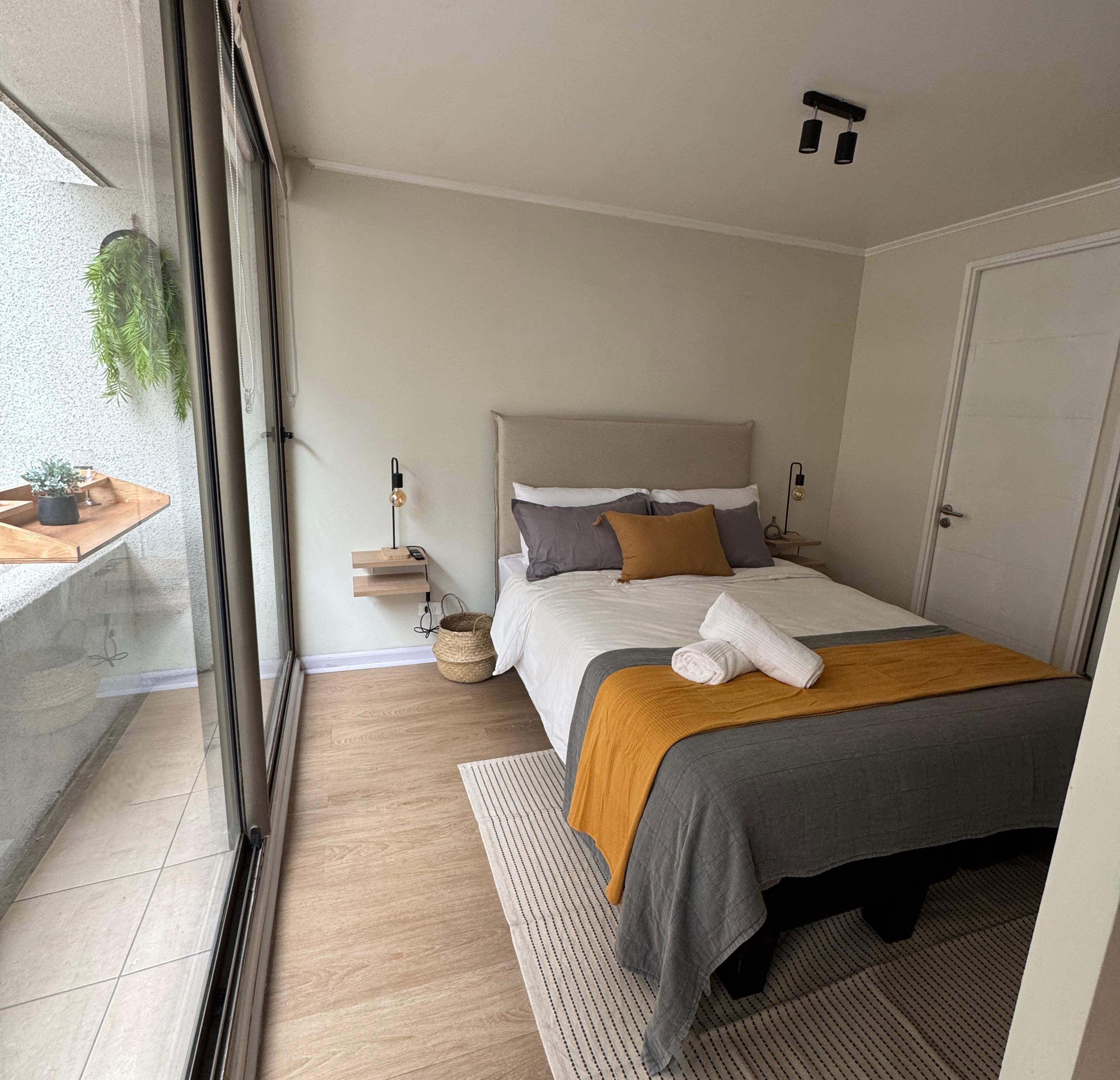 Habitación Elegante y cómodo departamento