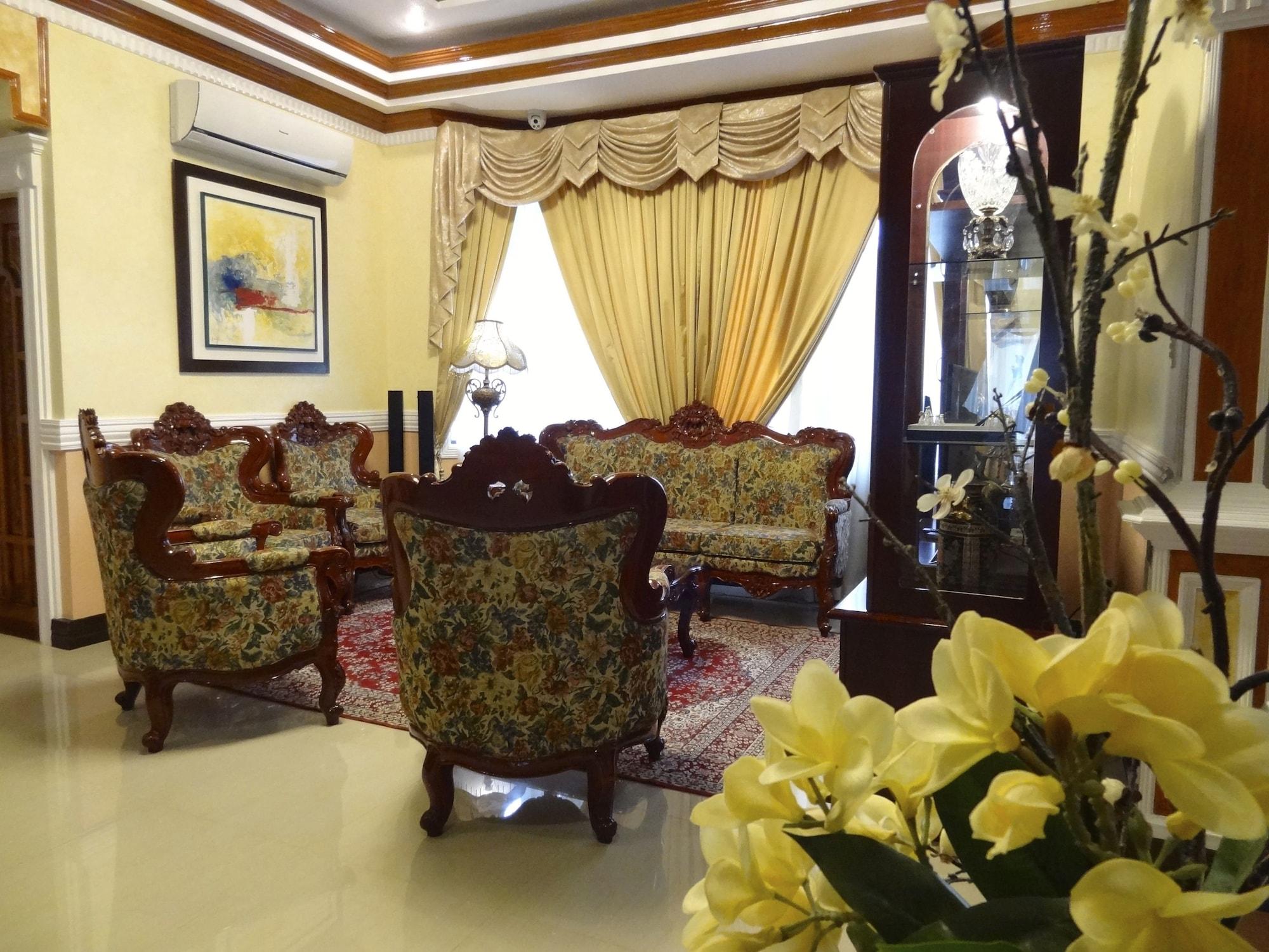 Vista Lobby The Executive Villa Inn & Suites