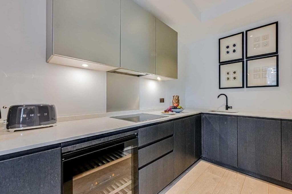 Equipamiento de Habitación Westminster Apartments by DMONTRIO
