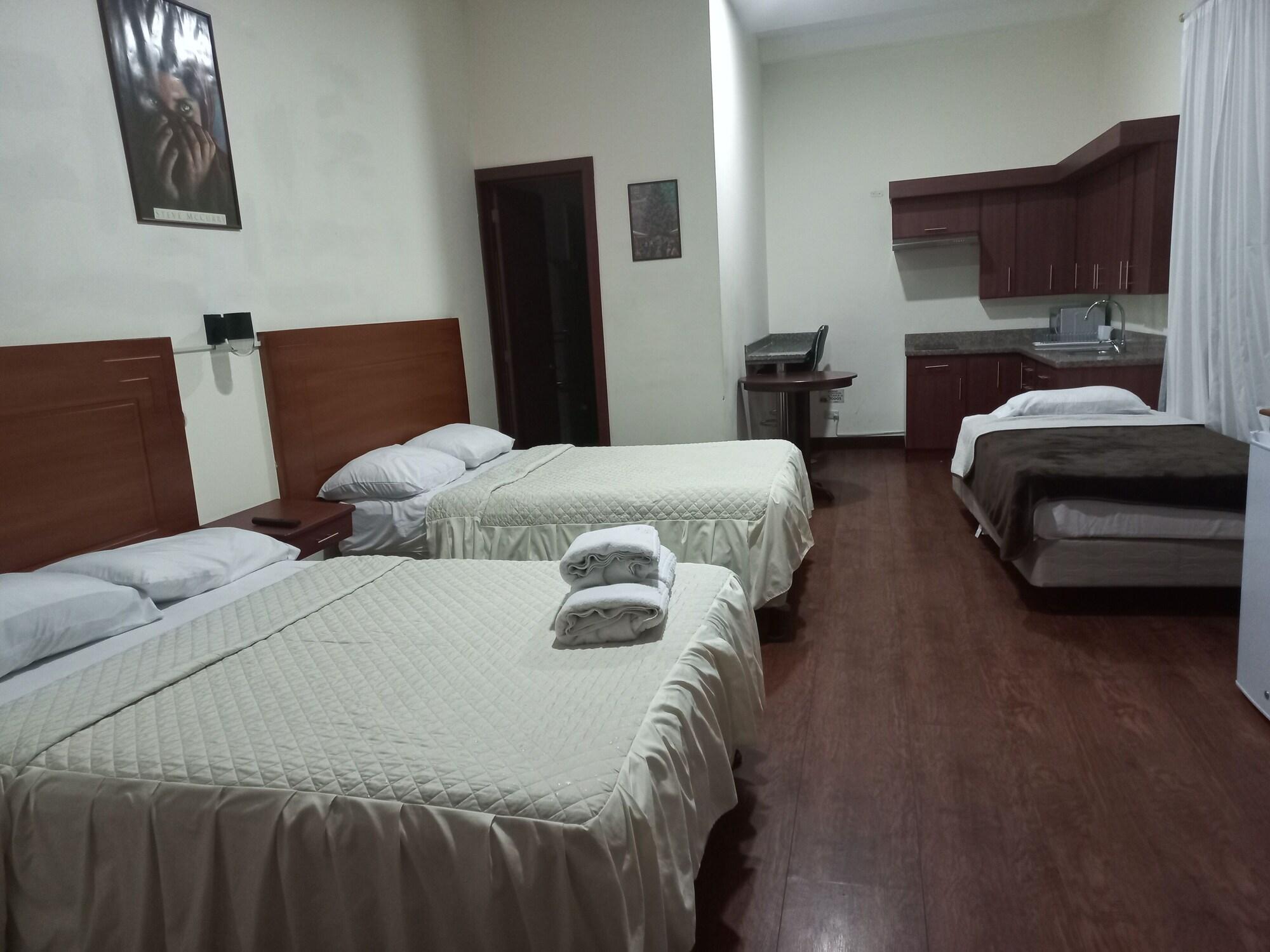 Habitación Tarque & Suites