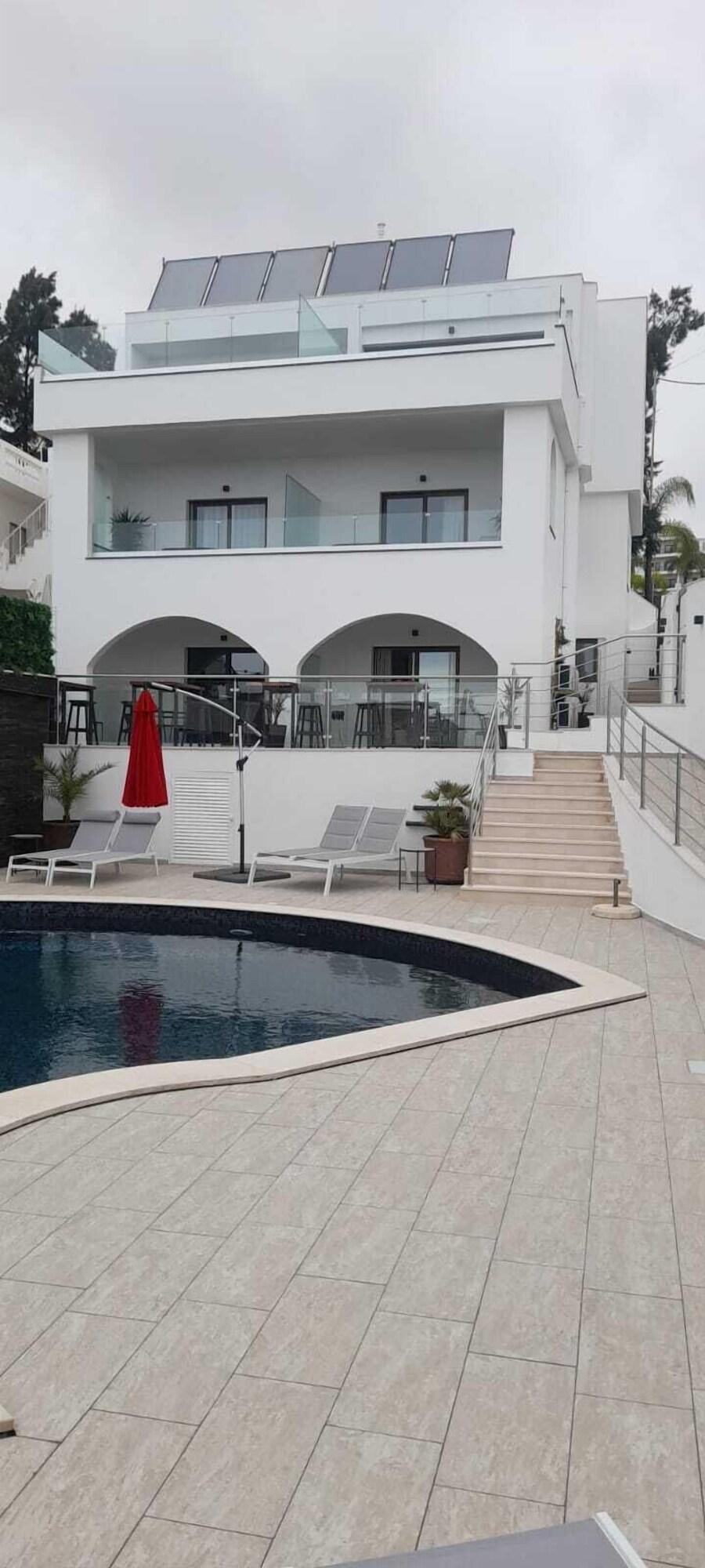 Varios Malpique Guest House & Jacuzzi