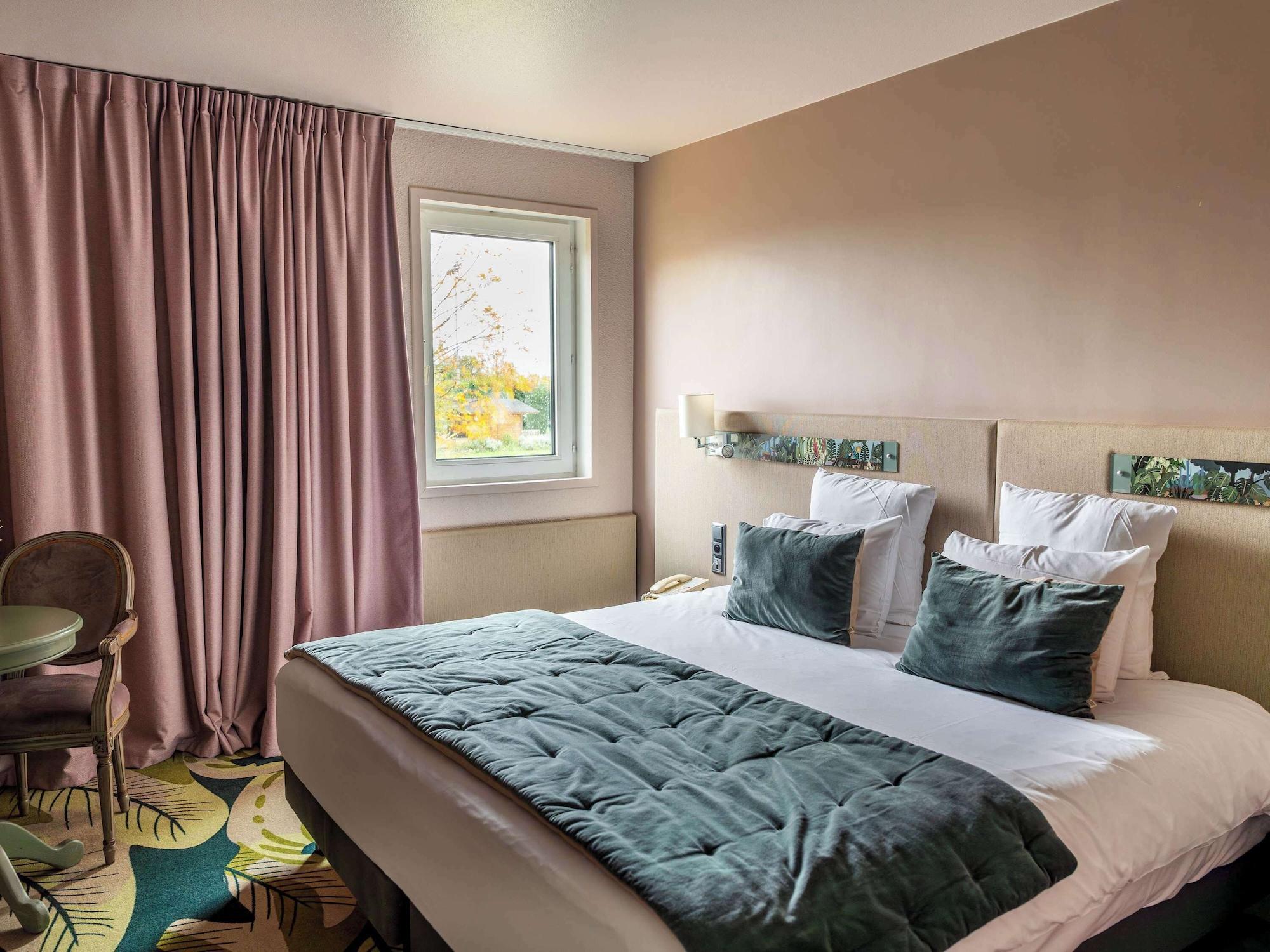 Habitación Demeures de campagne Parc du Coudray – Mercure