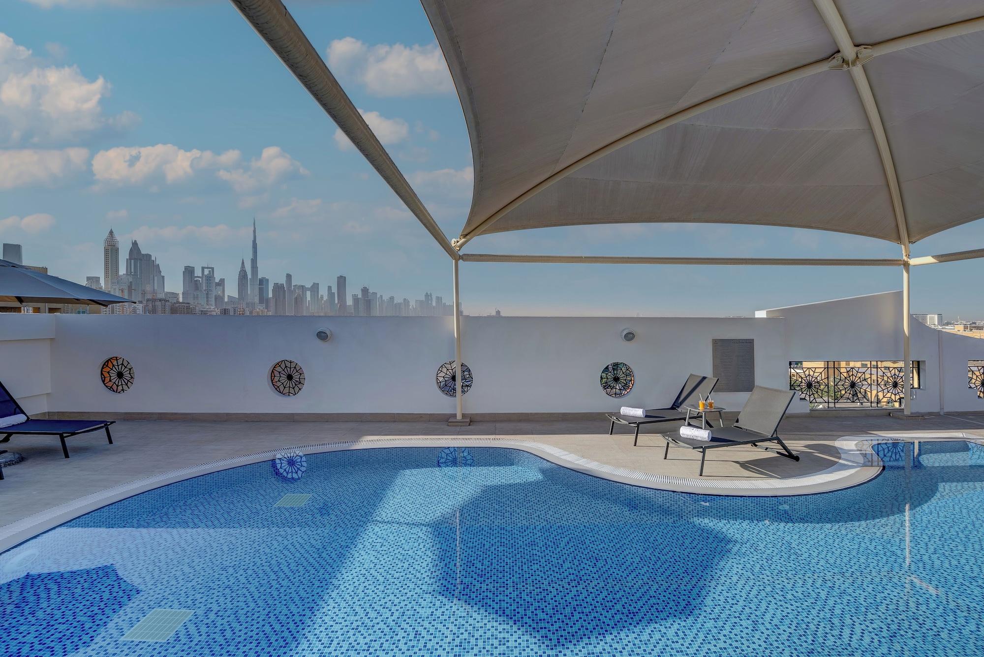 Vista Piscina Al Khoory Executive Hotel