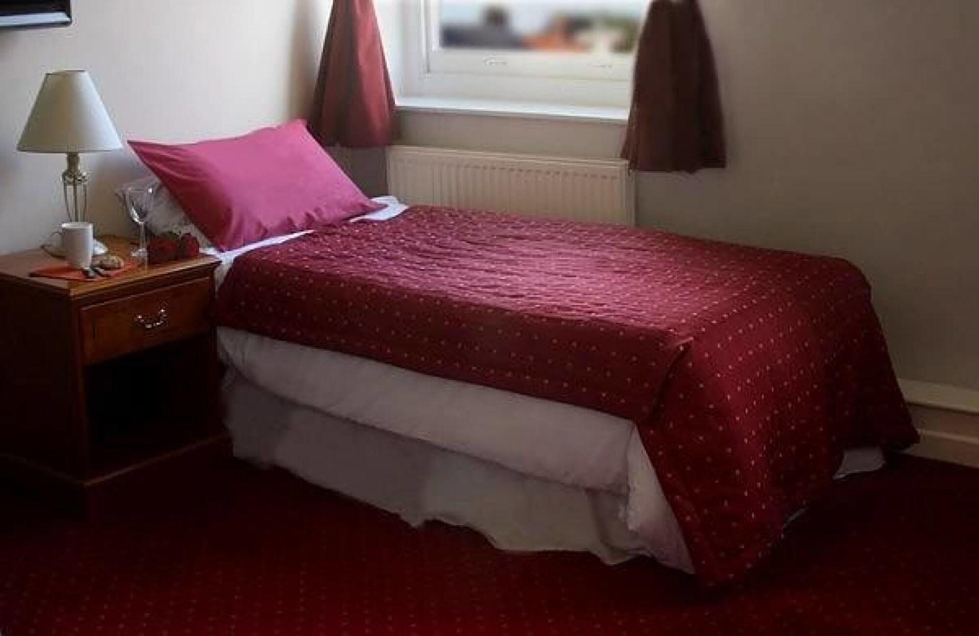 Habitación The Griffin Hotel